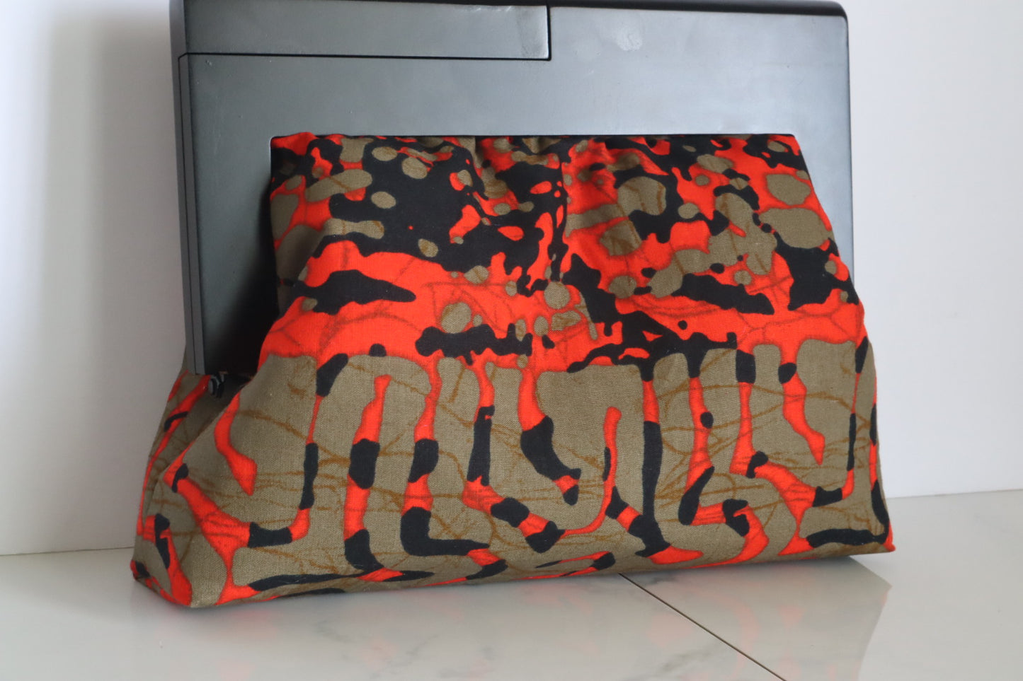 The Lava Mini Ankara Wooden Frame Ankara Clutch